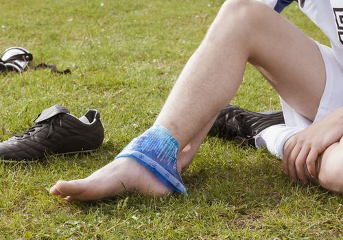 wellness soccer player icing ankle 59d4d428054ad90010127473