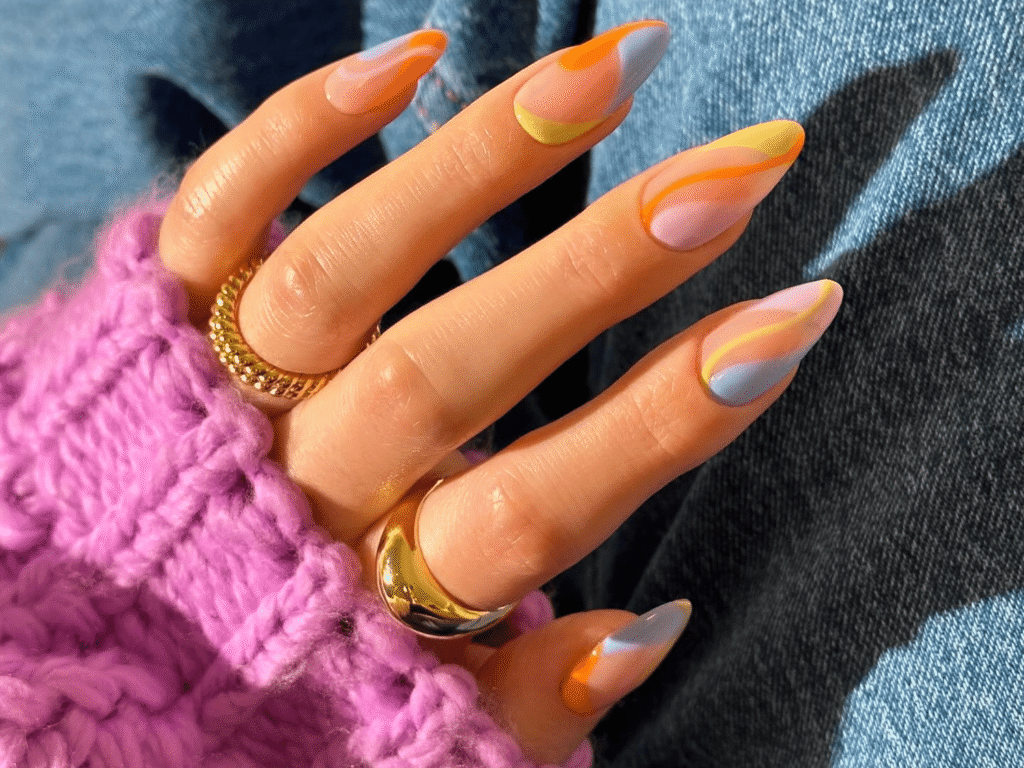 Nail extensions "Close-up of long, polished nail extensions with a stylish design."