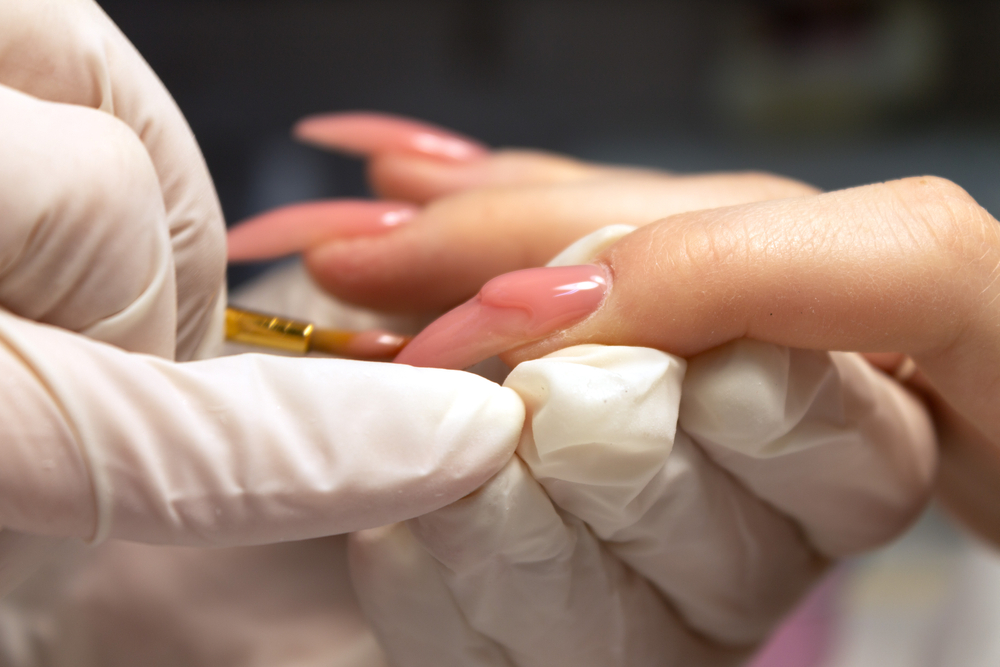 Nail extensions โClose-up of gel nail extensions shaped and cured on natural nails.โ